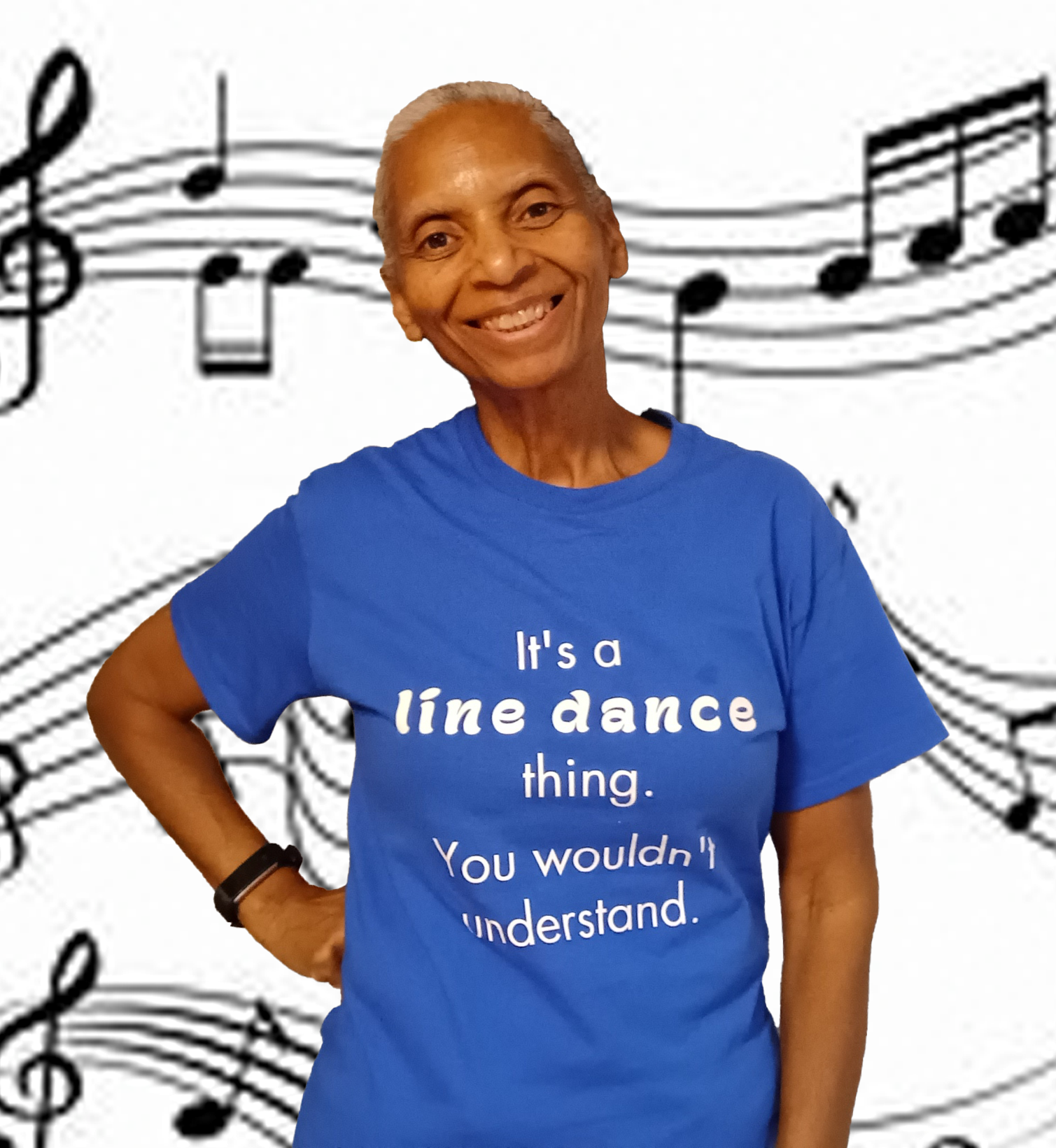 Smiling person in a blue T-shirt with music notes and the text “It’s a fine dance thing.”