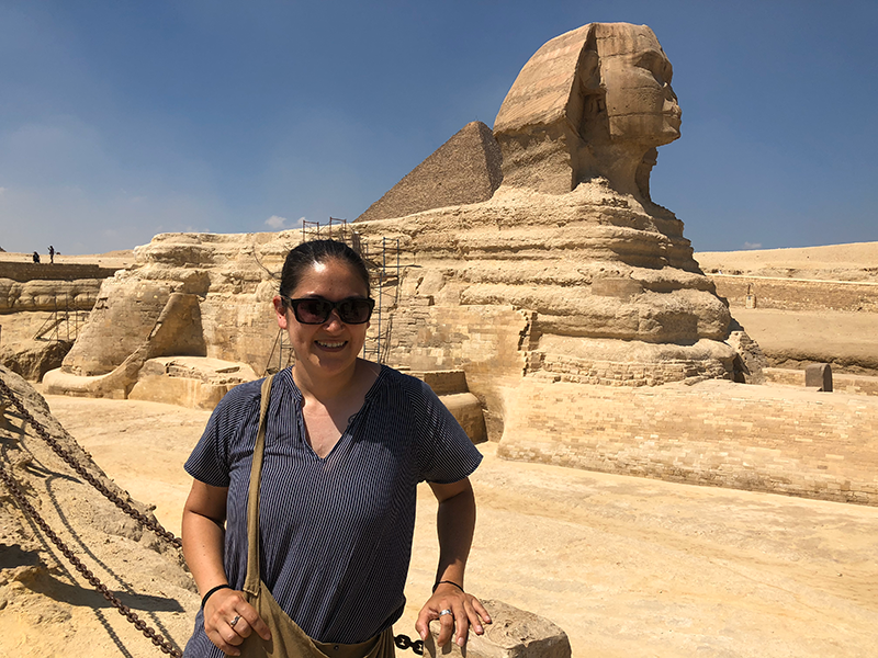 Felicia s standing in front of the sphinx statue.