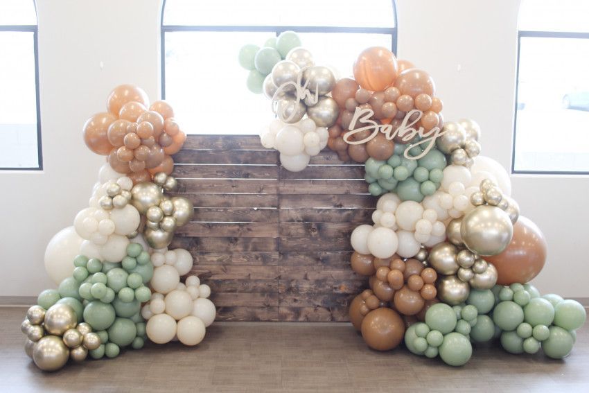 Rustic Balloon Arch and Wood Backdrop