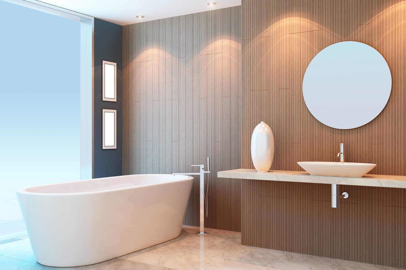 Modern bathroom with a white bathtub, sink, and wooden paneling; a round mirror hangs above the sink.