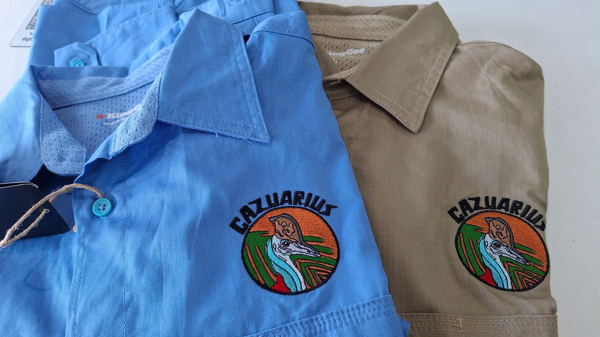 Two Uniforms In Blue And Beige — NMTG Embroidery In Wollongong, NSW