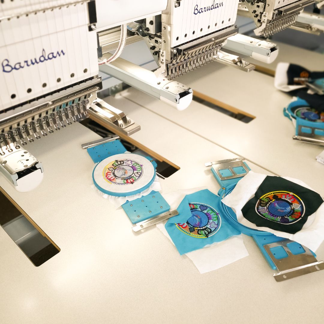 A Machine Making Personalised Embroided Logos — NMTG Embroidery In Wollongong, NSW
