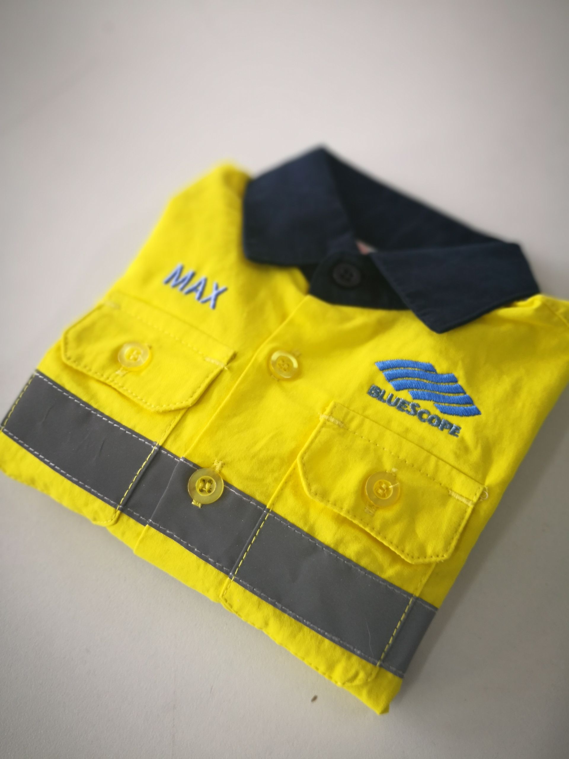 A Yellow Bluescope Shirt — NMTG Embroidery In Shellharbour, NSW
