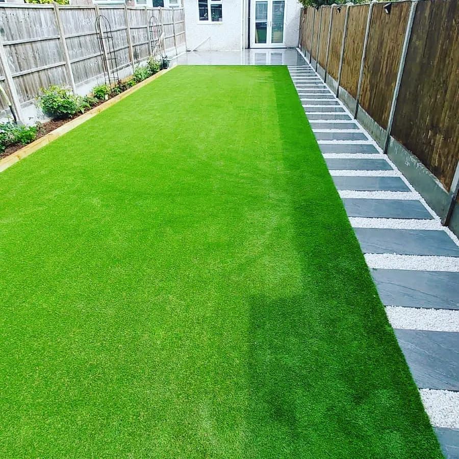 Zest Artificial Grass High Wycombe new artificial lawn with sleepers on one side and paving on the other