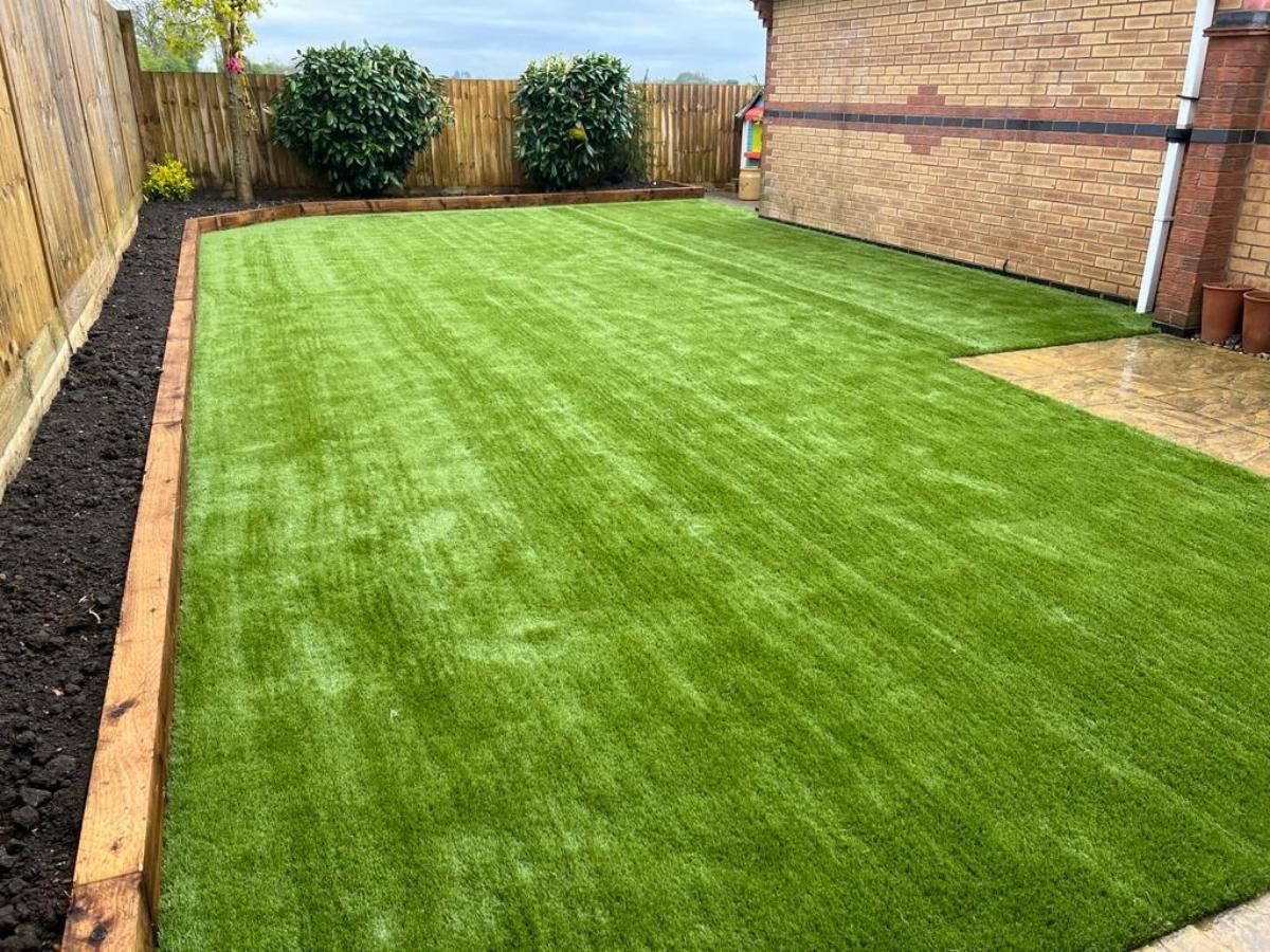 Zest Artificial Grass Dronfield new artificial lawn with sleepers surrounding
