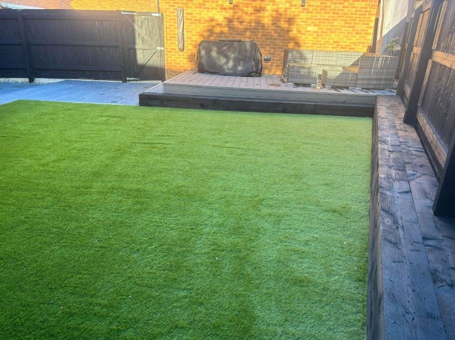 Zest Artificial Grass Grantham new artificial lawn with sleepers on one side and paving on the other