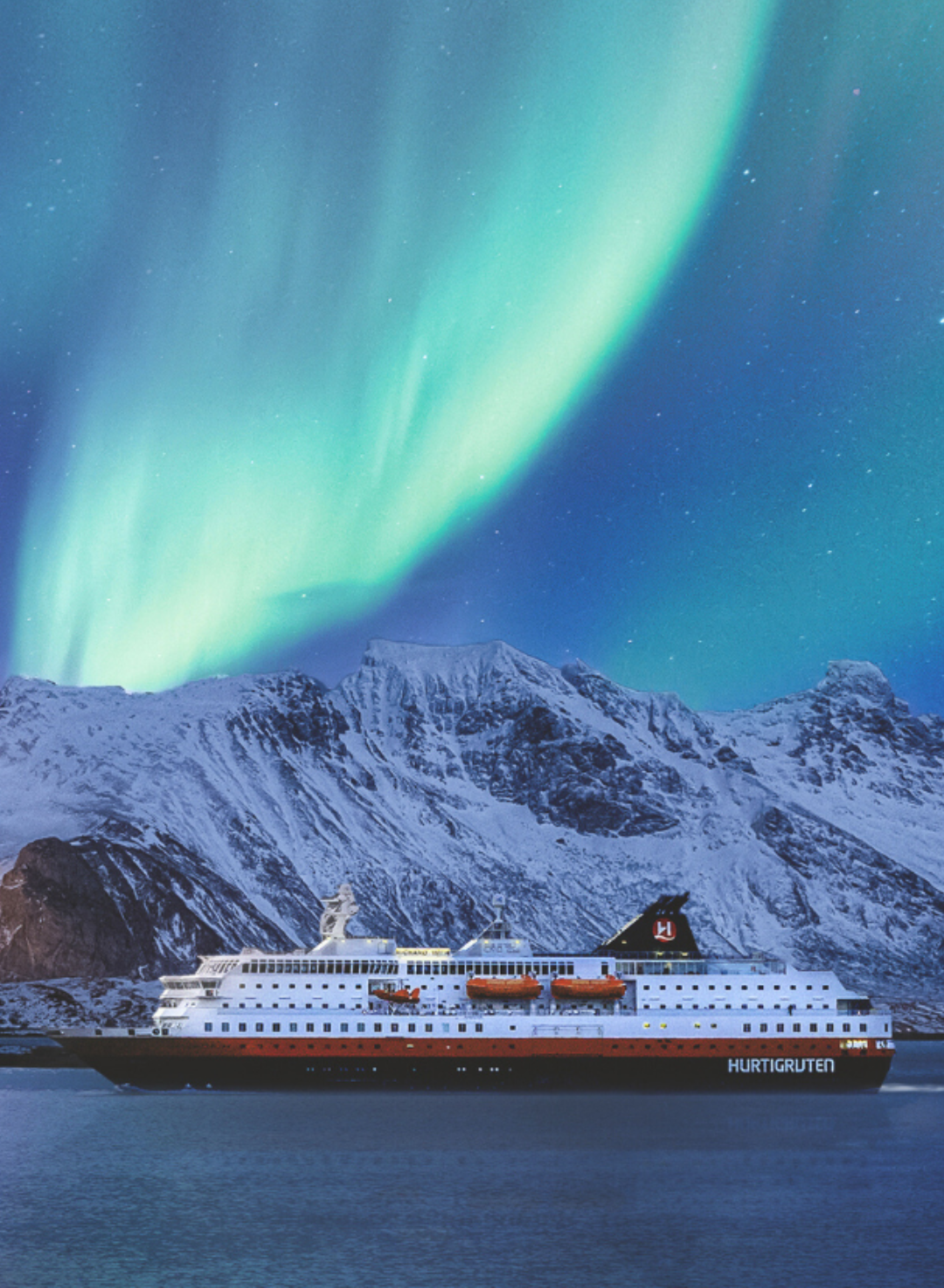 Cruise ship sailing below Northern Lights over snow-covered mountains.