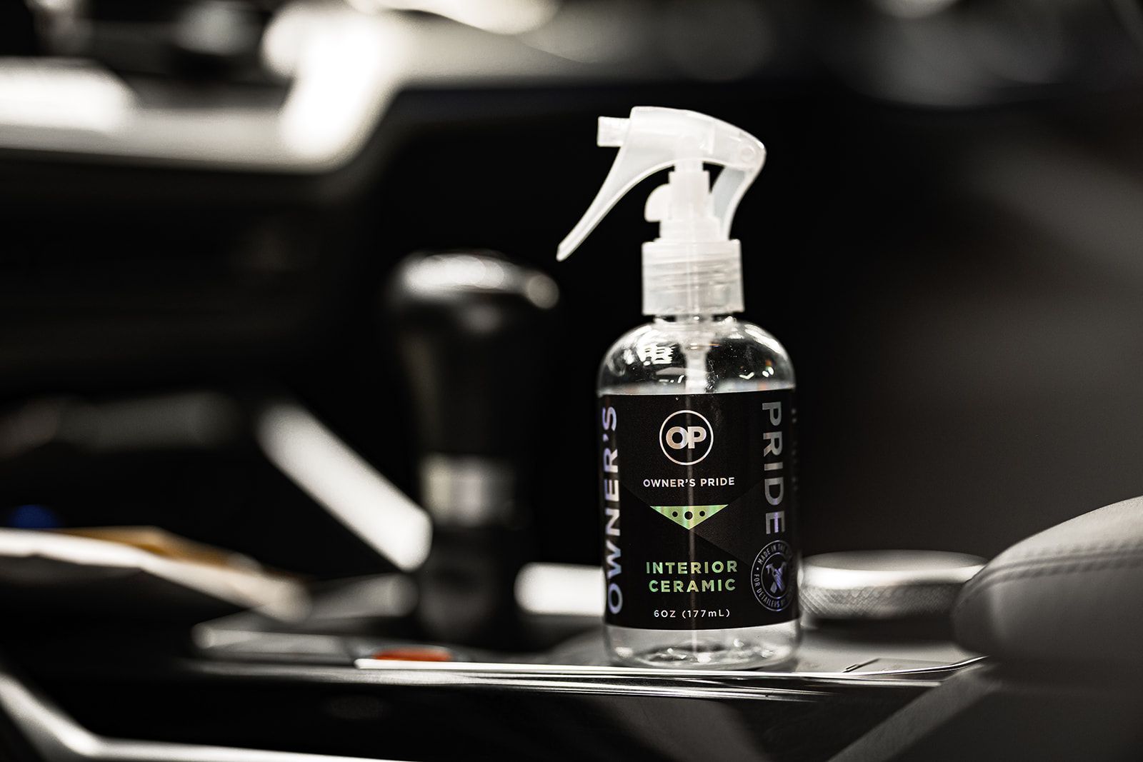 Black spray bottle labeled 
