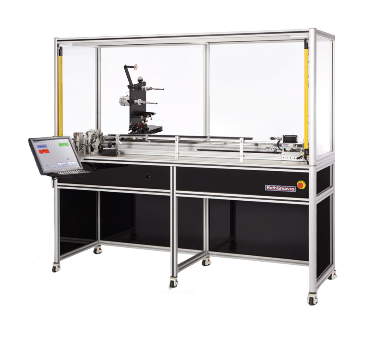 Industrial machine enclosed in clear safety panels with a touchscreen control panel on the left. rothgreaves coil winder parts