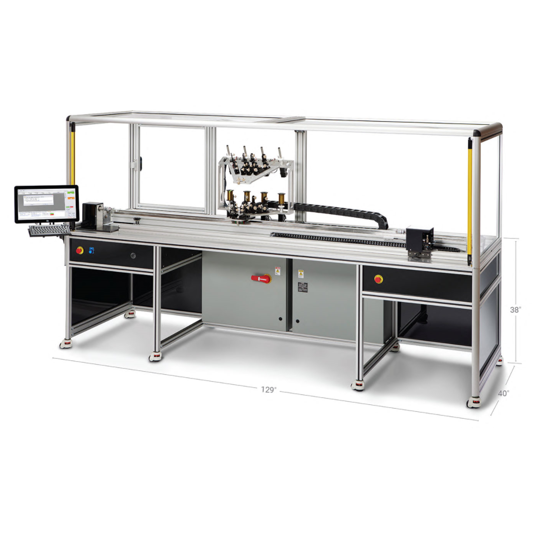 Industrial automated assembly machine with metal frame, conveyor, and control monitor on a white background