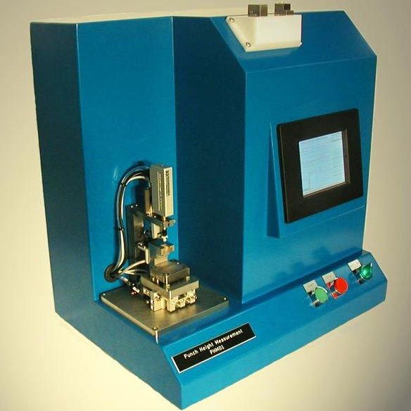 Blue automated machine with a touchscreen and control buttons, likely a laboratory or industrial testing device.