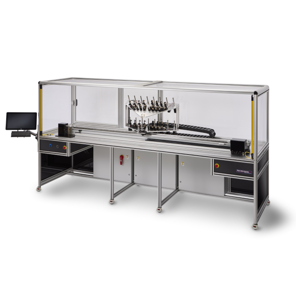 Industrial machine with enclosed conveyor line, control monitor, and metal frame on white background