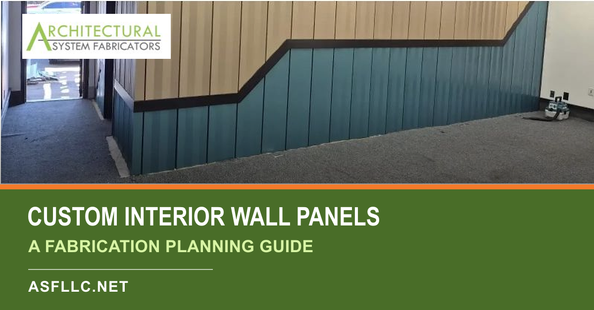 Two-tone custom interior wall-panel layout with lighter upper panels, blue lower panels, and dark transition trim.
