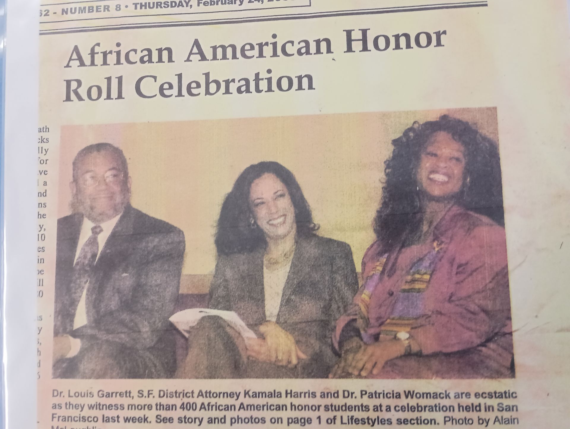 A newspaper article about an african american honor roll celebration