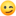 A blurry picture of a smiley face with one eye closed.