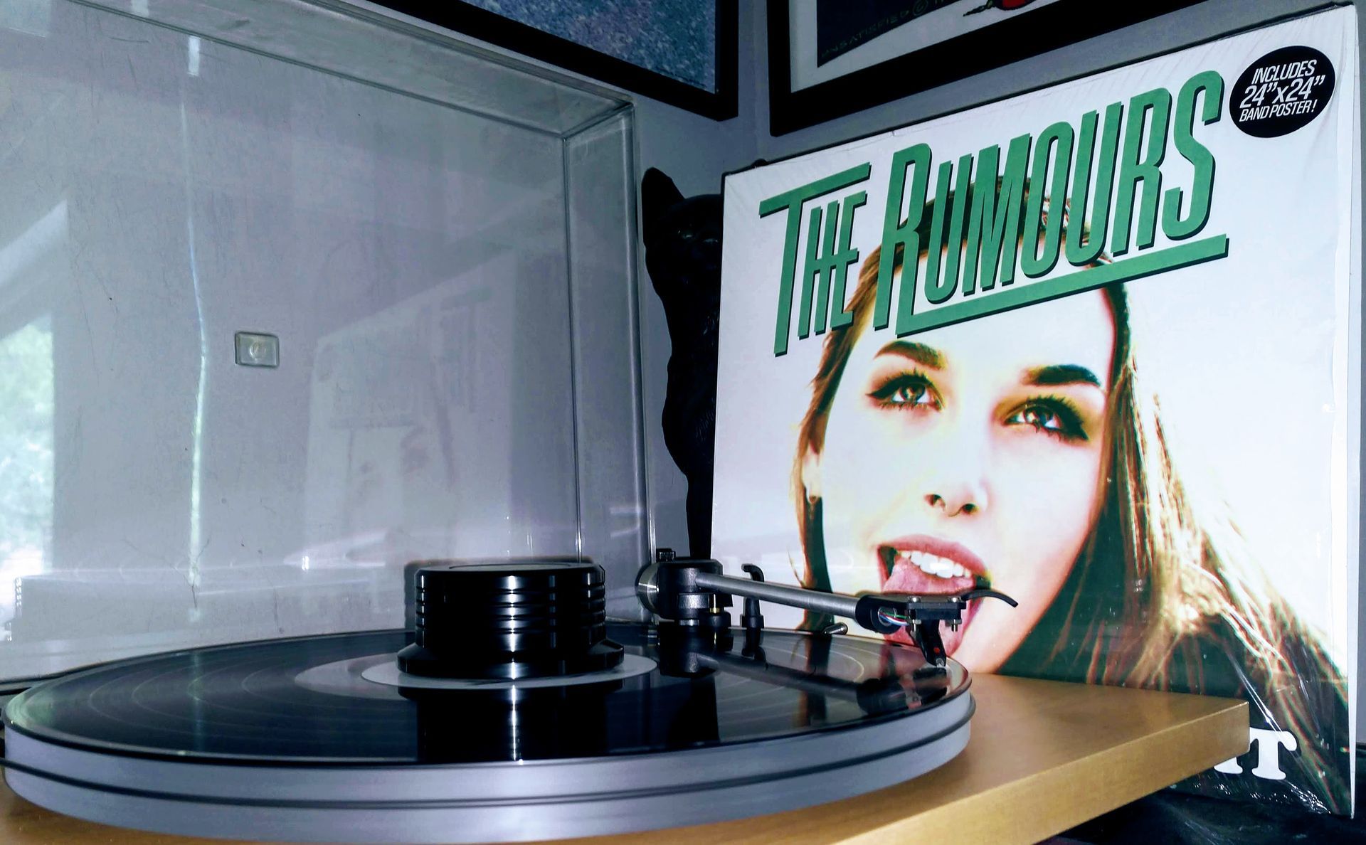 A record player with a picture of a woman and the words 