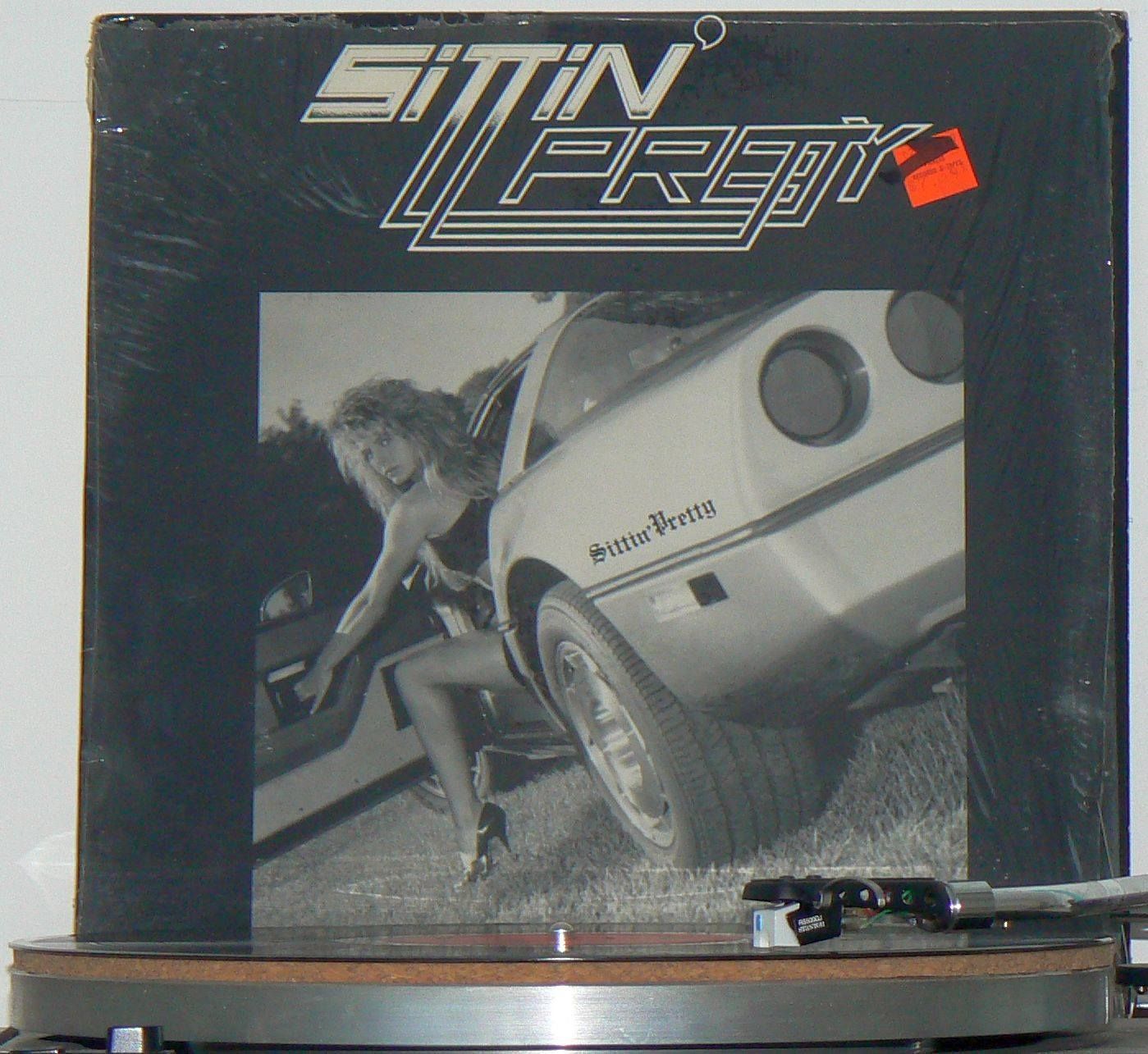 A sitin preta album is on a record player