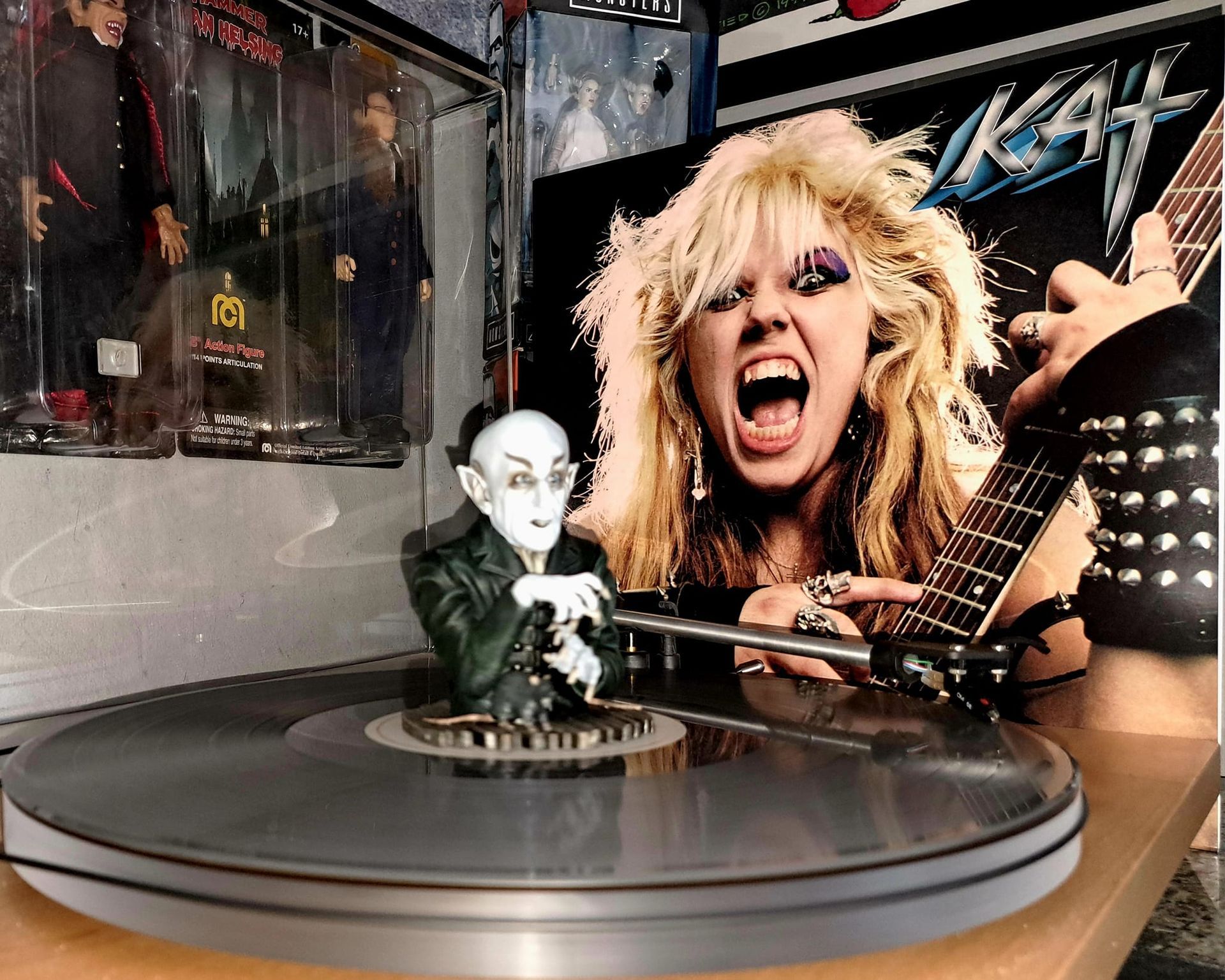 A record player with a picture of kat on it
