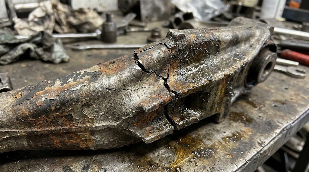 Broken car part with wear and tear