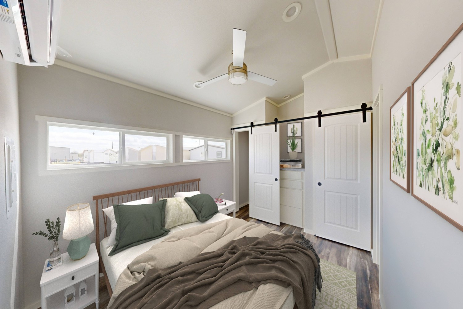 Bedroom with bed, windows, closet, and artwork. Neutral tones, inviting space.