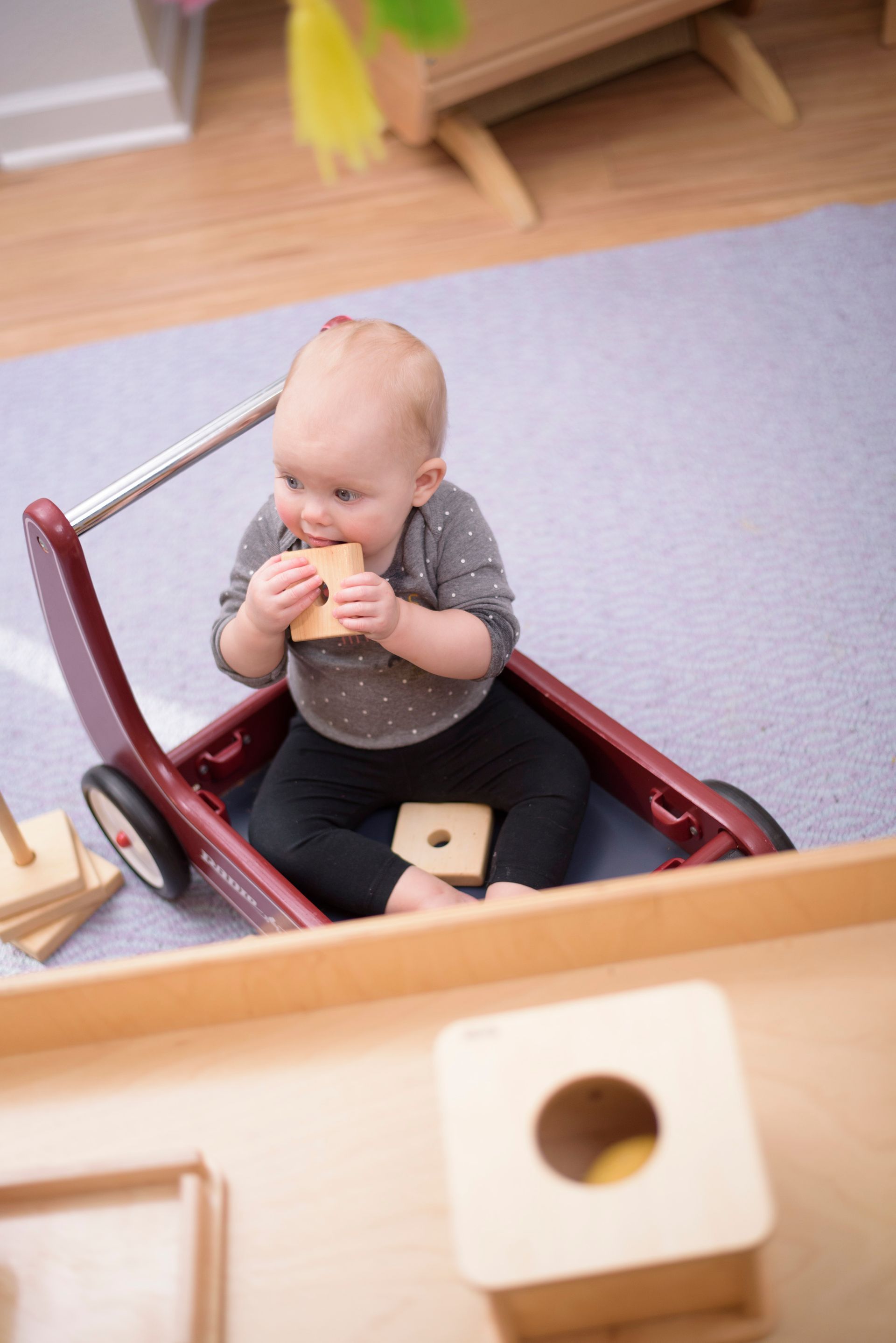 Montessori infant seating in a cart
