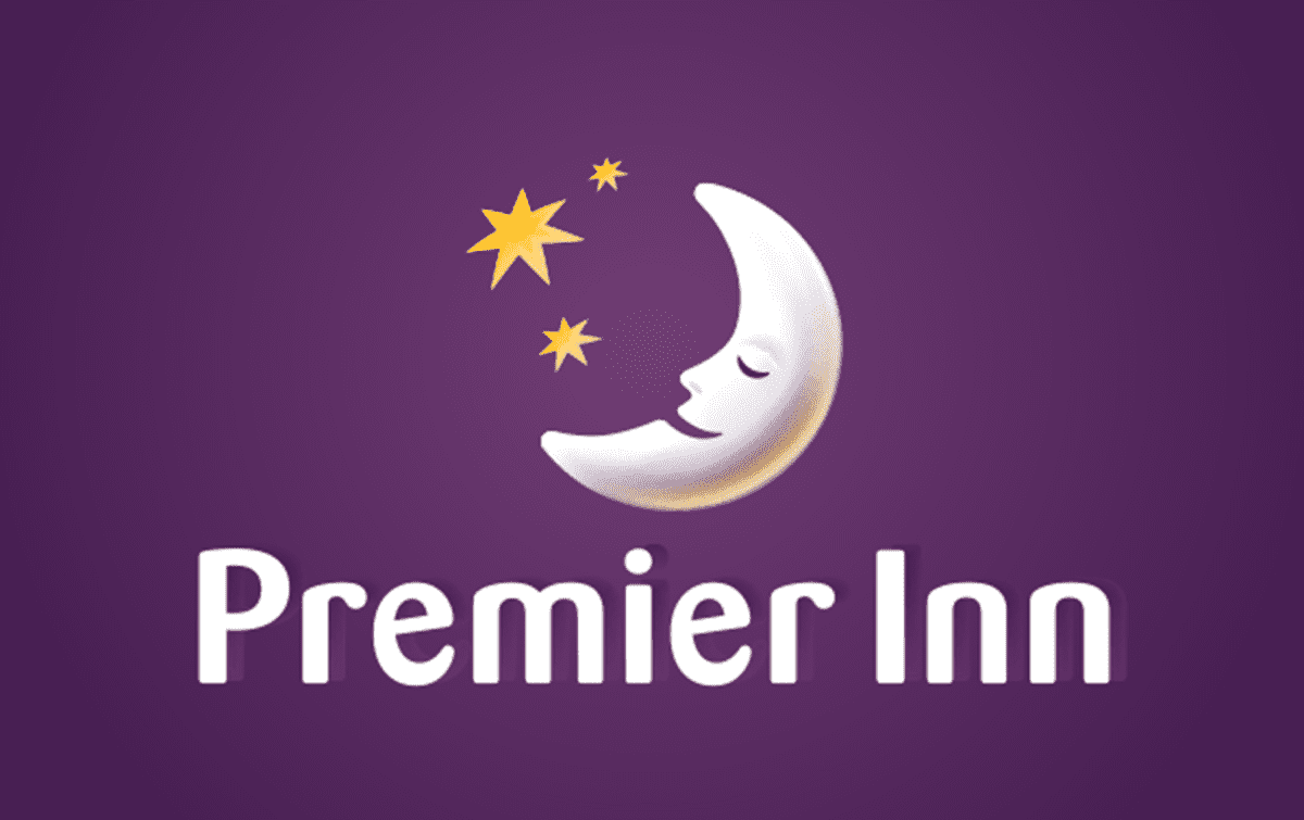 The premier inn logo has a sleeping moon and stars on a purple background.