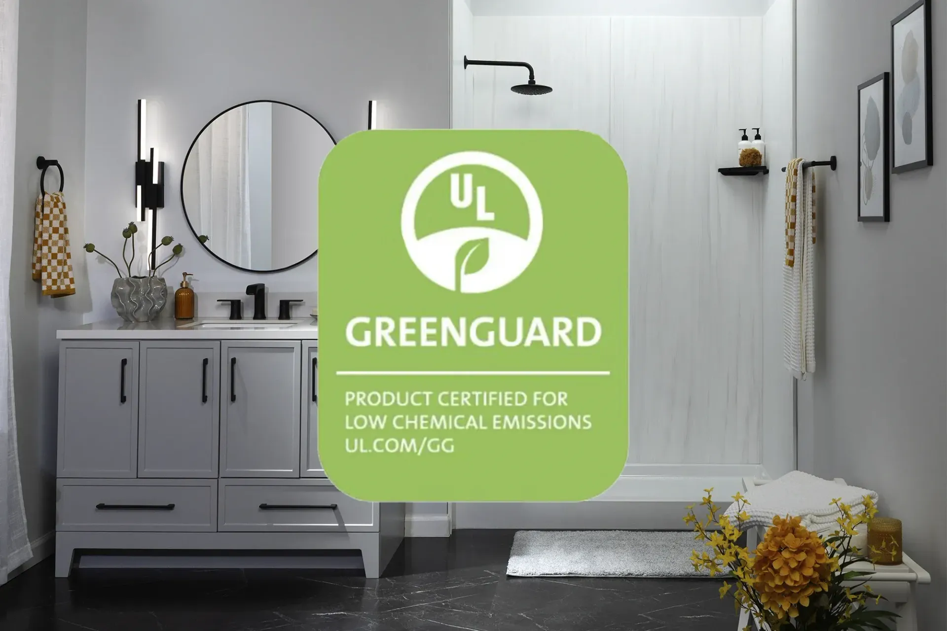 GreenGuard certification badge over a modern gray bathroom with white sink and round mirror