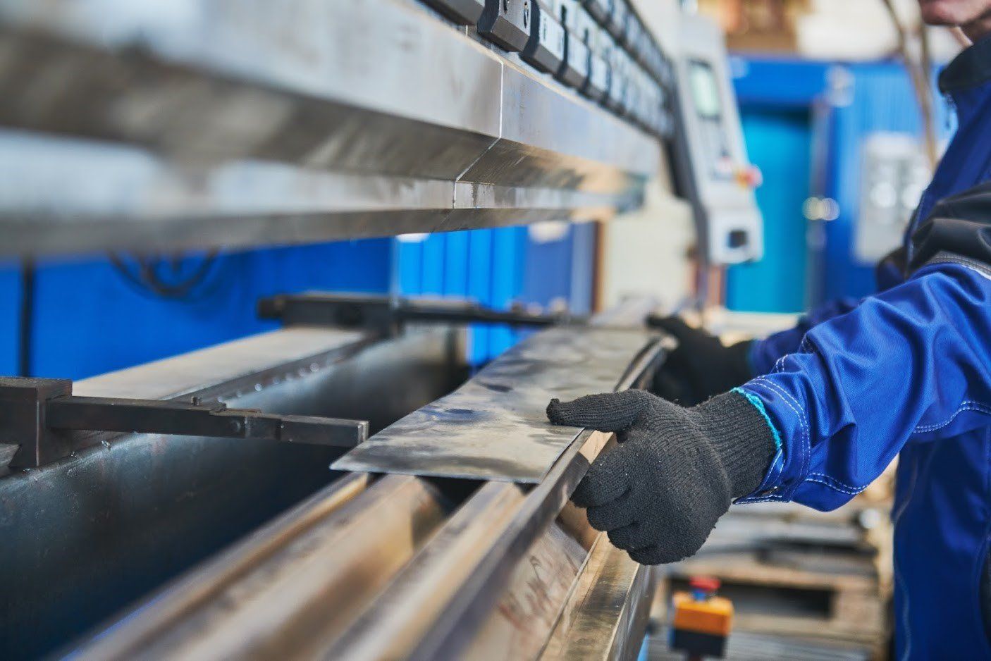 A worker holding a metal plate — Chicago Heights, IL — Big Daddy Scrap