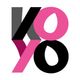 Stylized black, pink, and gray “K/8” logo on a white background