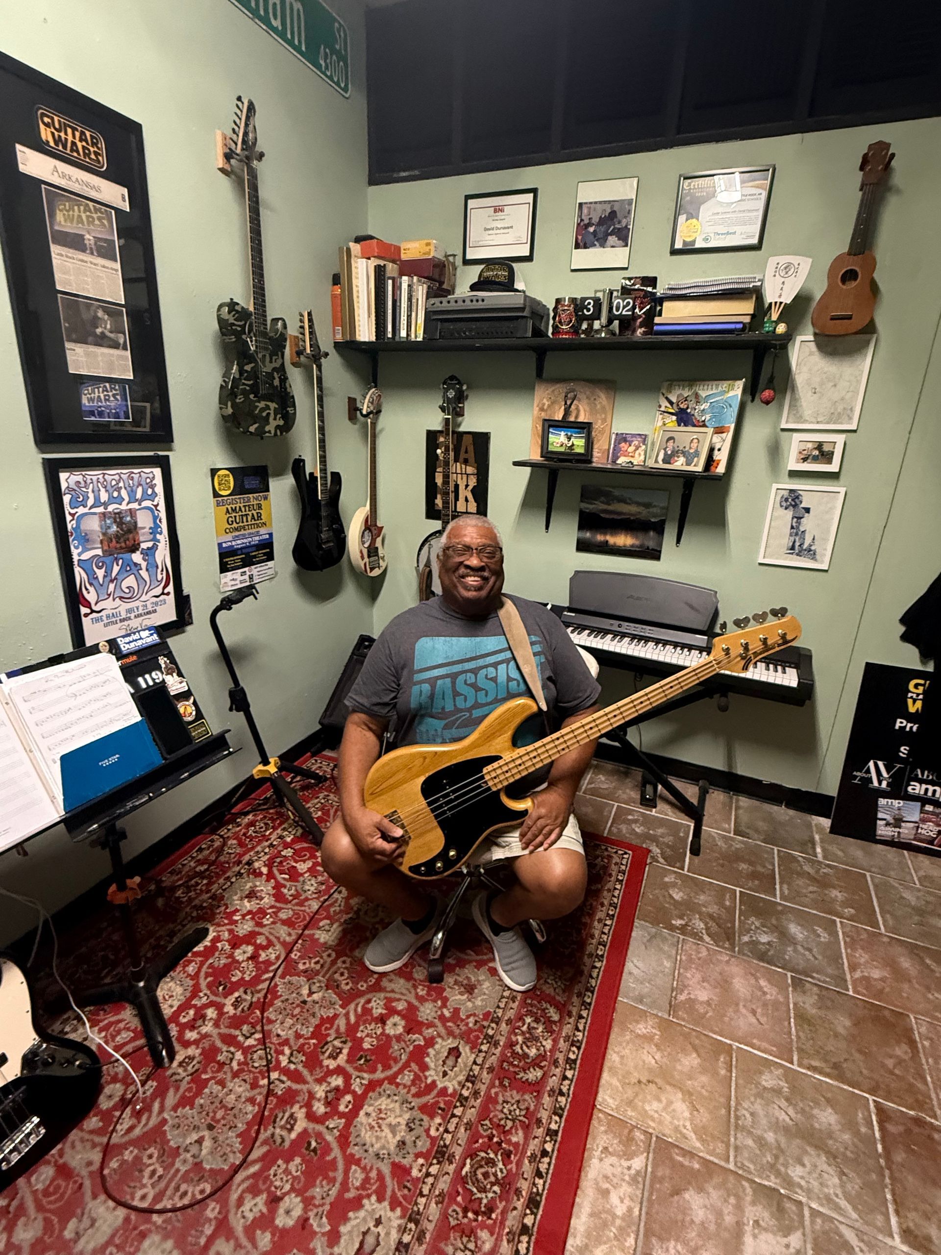 David Dunavant's teaching studio with a student playing the guitar.