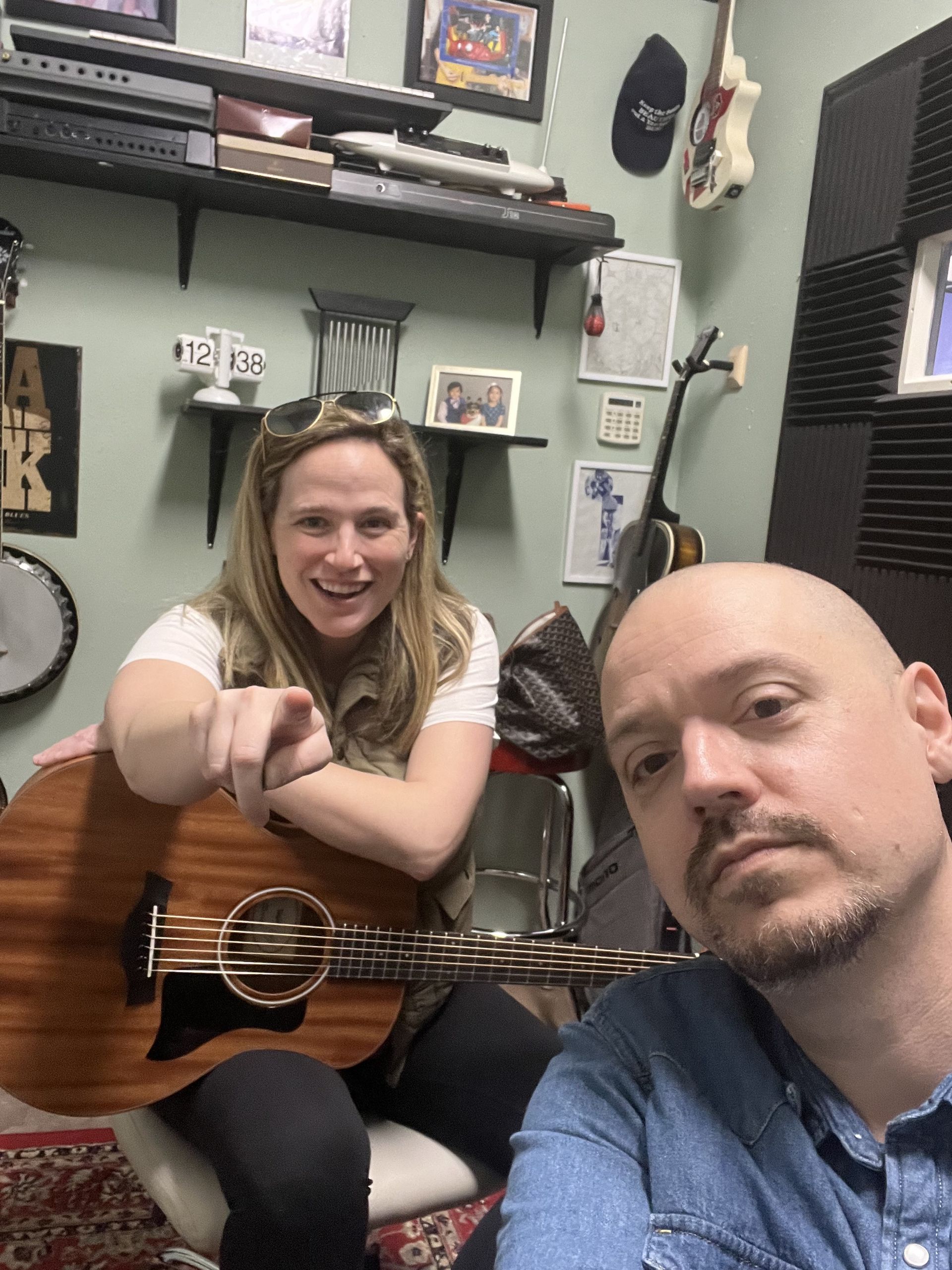 Selfie photo of David Dunavant and a student in his teaching studio.