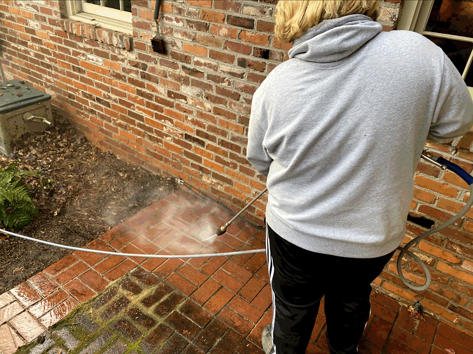 Pressure washing home exterior improves curb appeal
