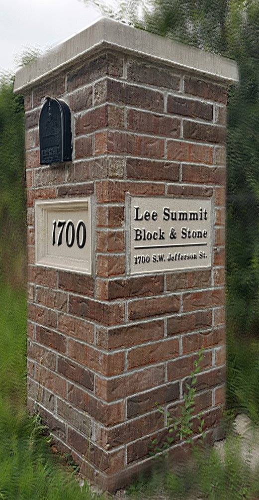 Brick pillar sign for Lee Summit Block & Stone, with house number 1700
