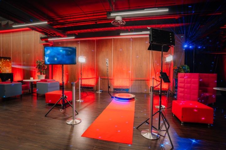 There is a red carpet in the middle of the room.