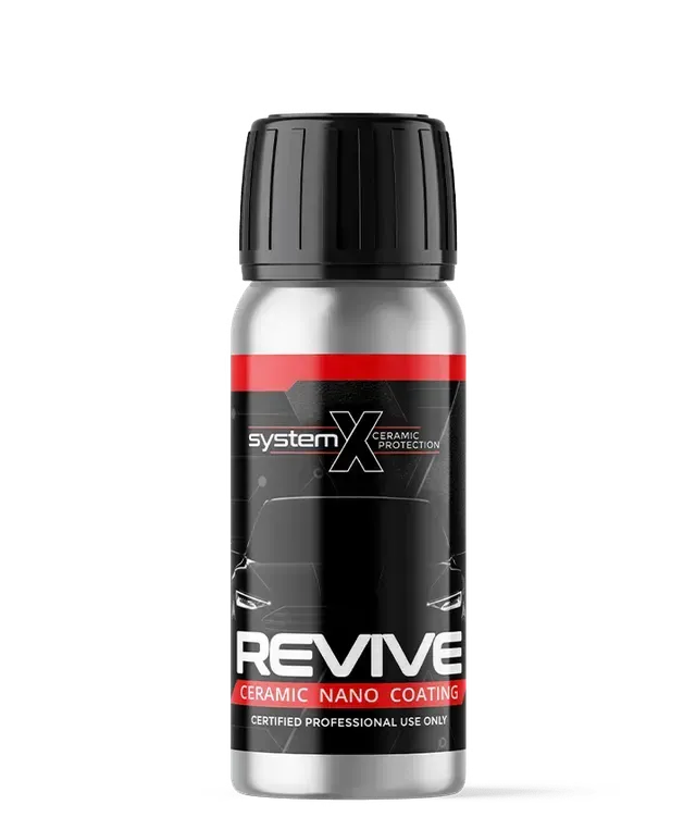 Black bottle of Revive ceramic nano coating with red and white label on a white background