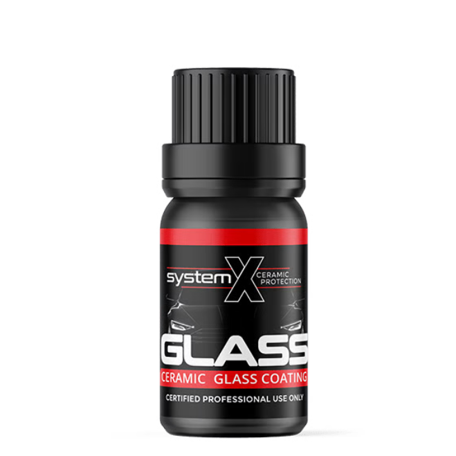 Black bottle of System X ceramic glass coating on a white background