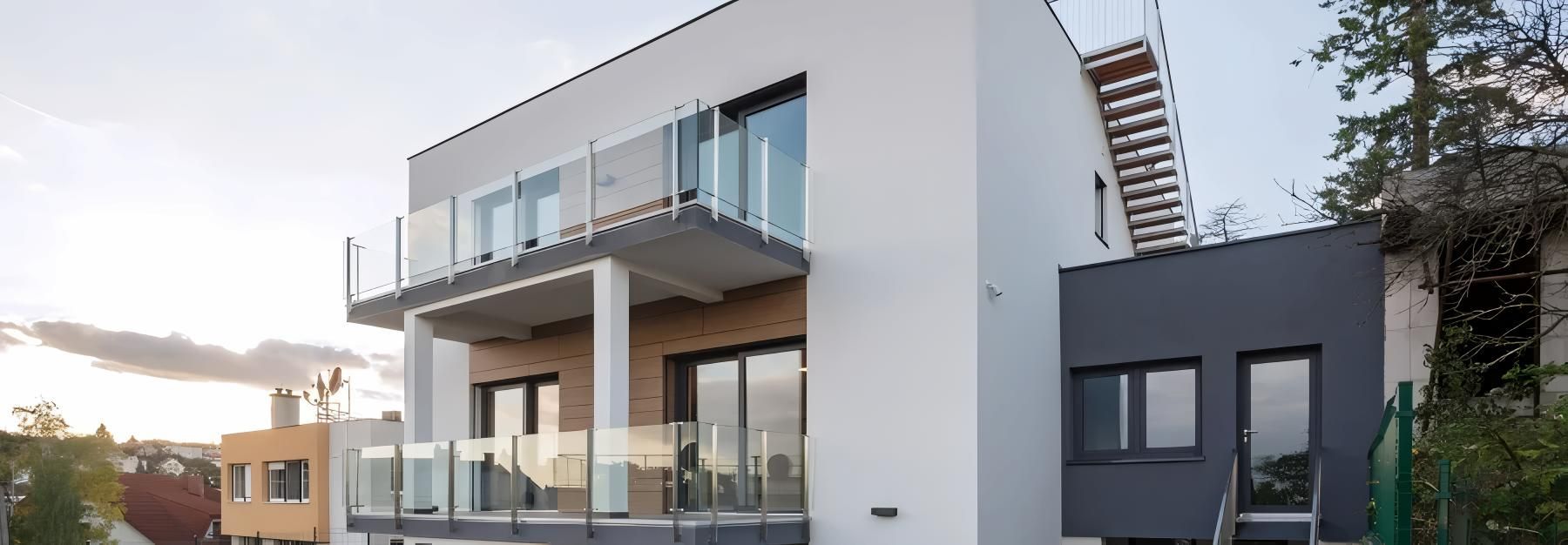 A Large White Building With Windows — O'Brien Painting Contractors in Alexandra Headland, QLD