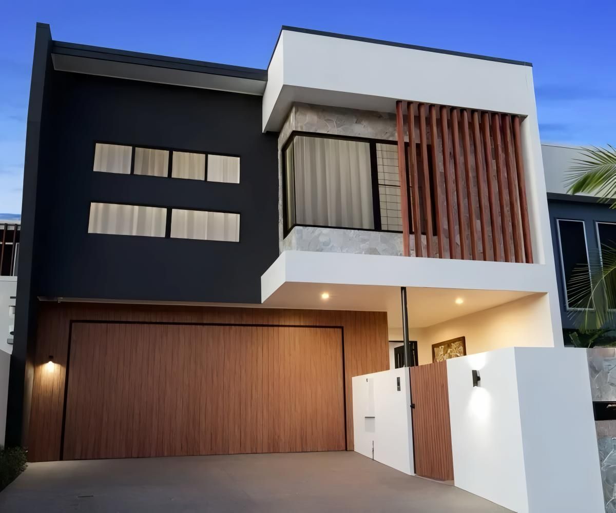 A Black and White House With a Wooden Garage Door — O'Brien Painting Contractors in Coolum, QLD