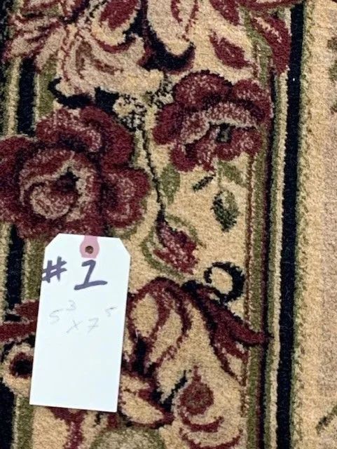 A rug with a tag that says # 2 on it