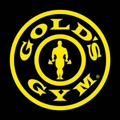 A gold 's gym logo on a black background