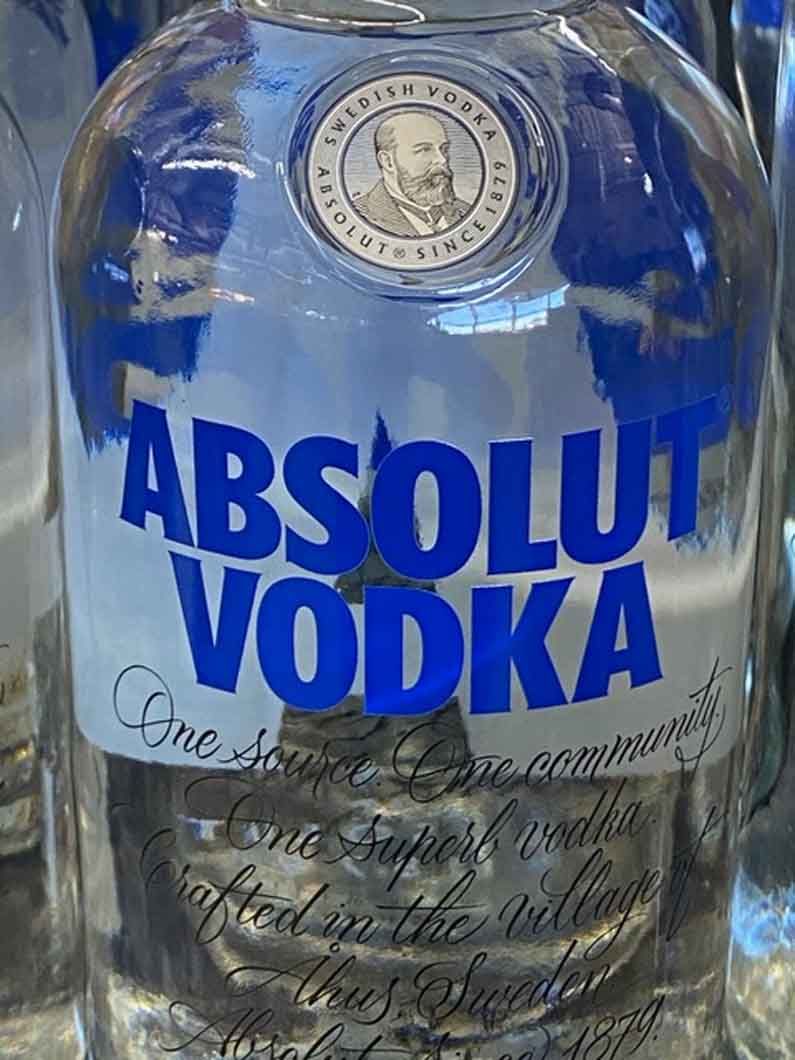 A close up of a bottle of absolut vodka