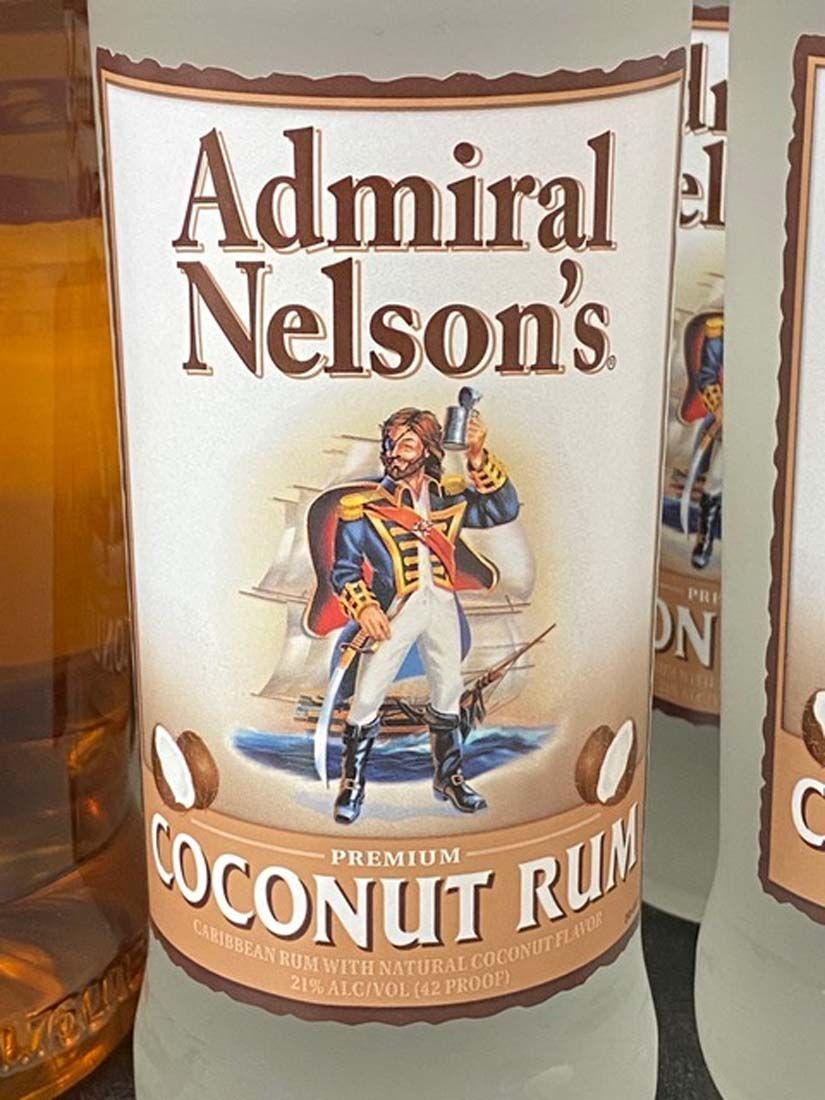 A close up of a bottle of admiral nelson 's coconut rum