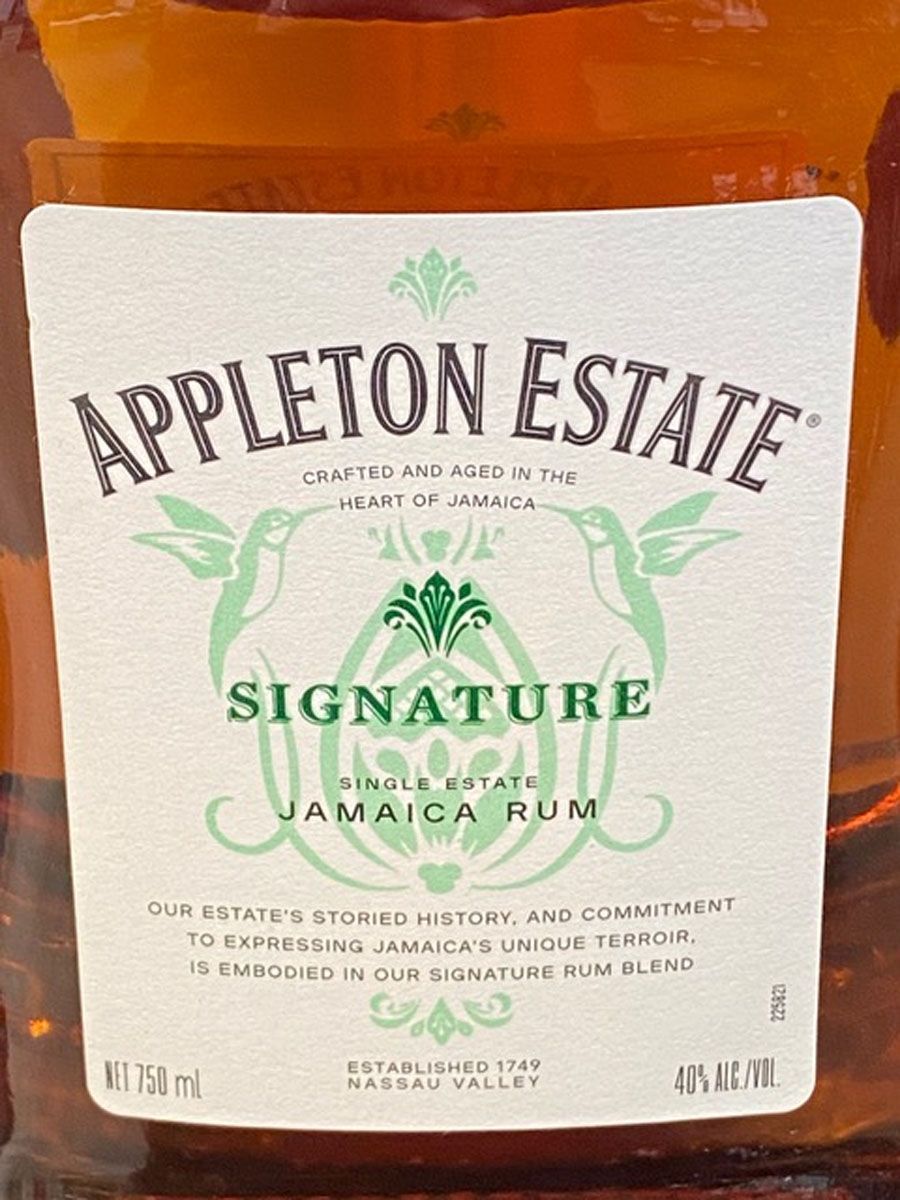 A bottle of appleton estate signature jamaica rum