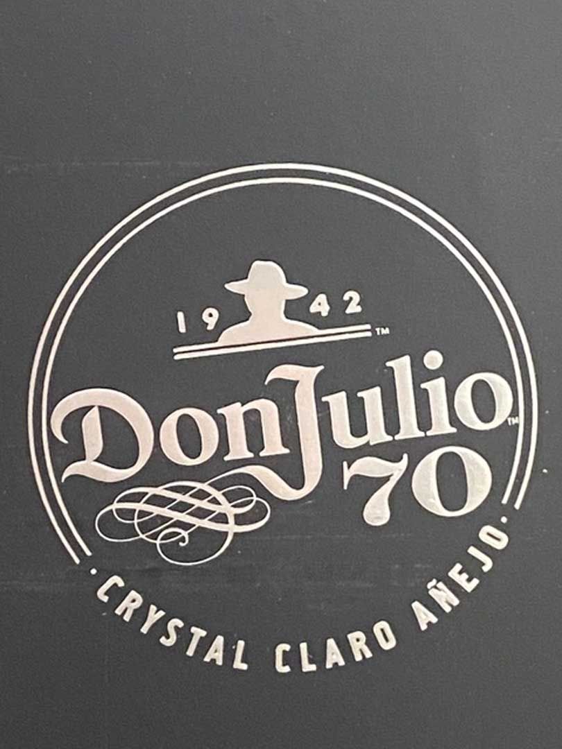 The logo for don julio 70 crystal claro añejo