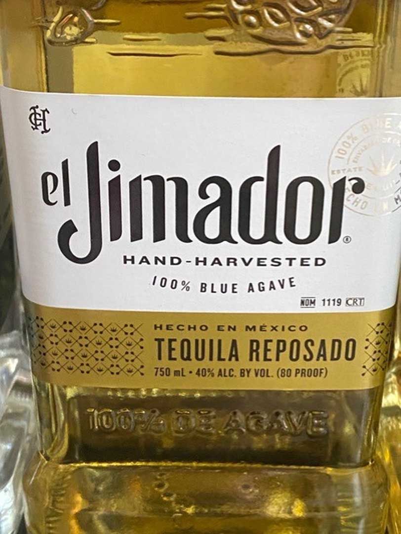 A bottle of el jimador hand harvested tequila reposado