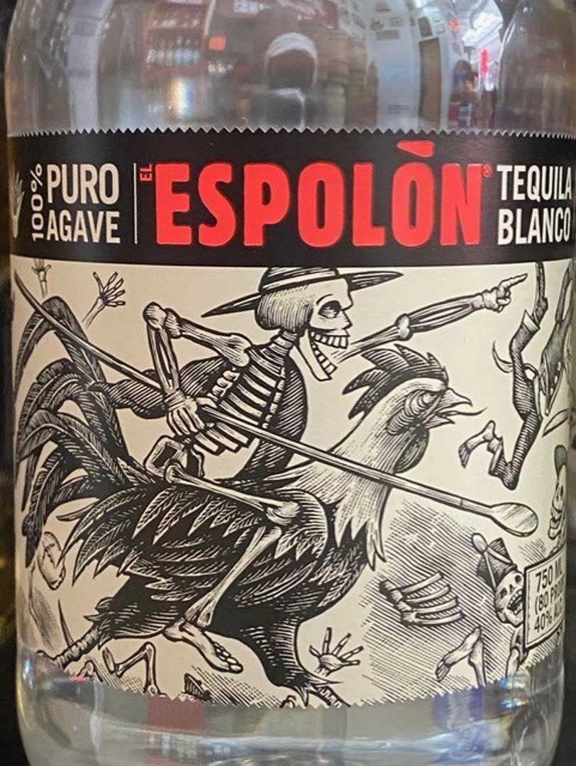 A bottle of tequila with a skeleton on the label