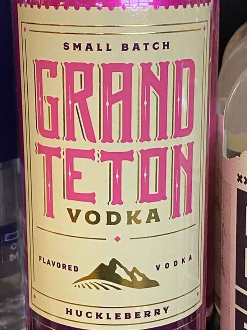 A close up of a bottle of grand teton vodka
