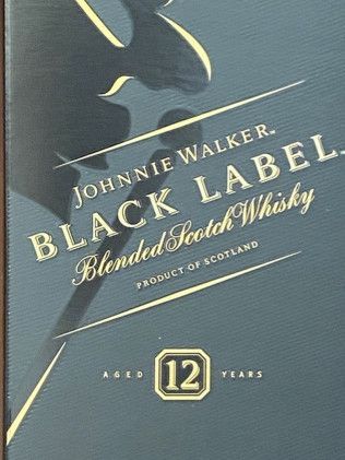 A box of johnnie walker black label blended scotch whisky