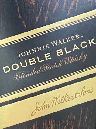 A bottle of johnnie walker double black blended scotch whisky