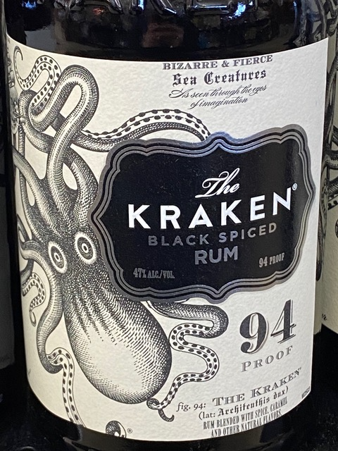A bottle of the kraken black spiced rum with an octopus on the label
